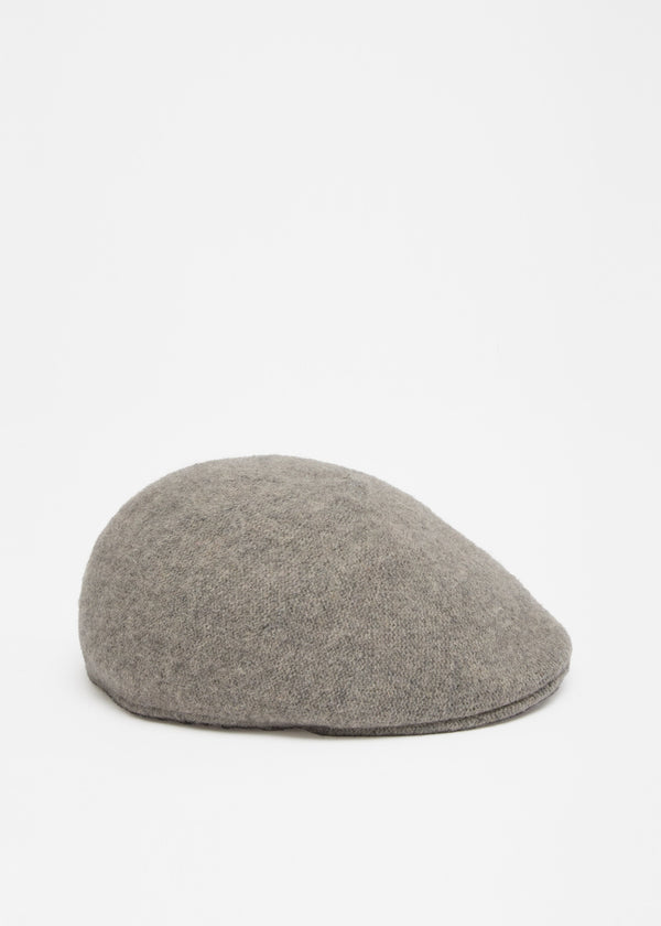 Gray flat cap on a white background