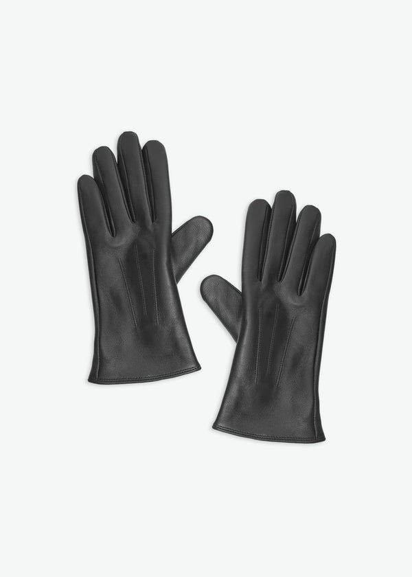 Pair of black gloves on a white background