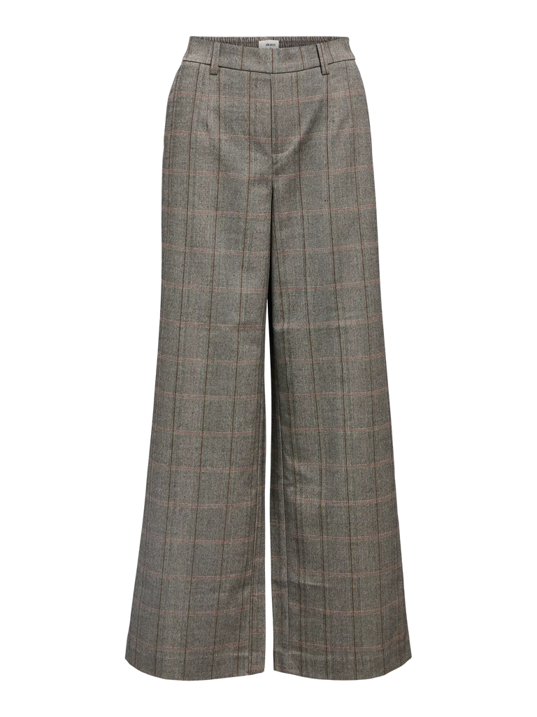 Plaid patterned pants on a white background