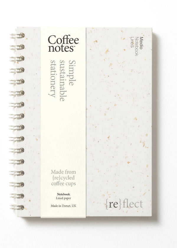 Notebook with 'reflect' branding on a white background