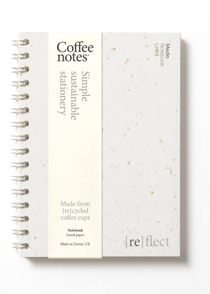 Notebook with 'reflect' branding on a white background