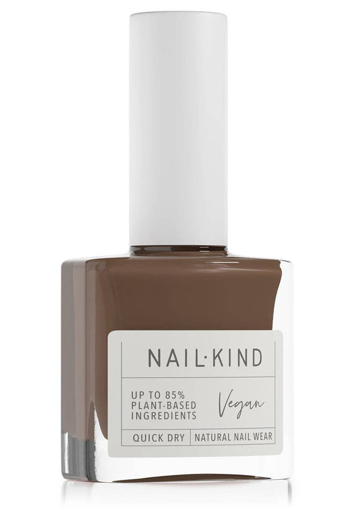 Nail polish bottle with a white cap and visible label on a white background