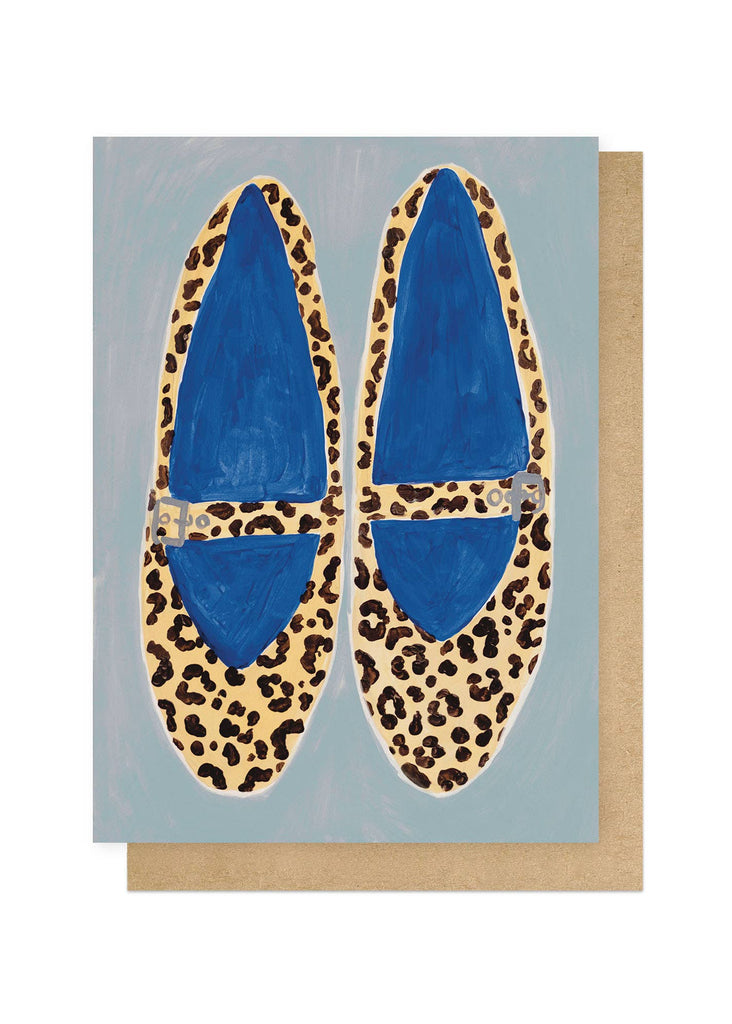 Greeting card with blue shoes with leopard print pattern on a light blue background