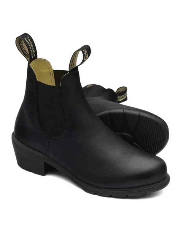 A pair of black Chelsea boots with elastic side panels and pull tabs, shown on a plain white background.