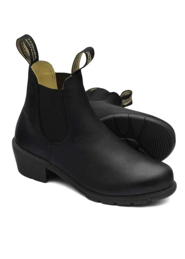 A pair of black Chelsea boots with elastic side panels and pull tabs, shown on a plain white background.