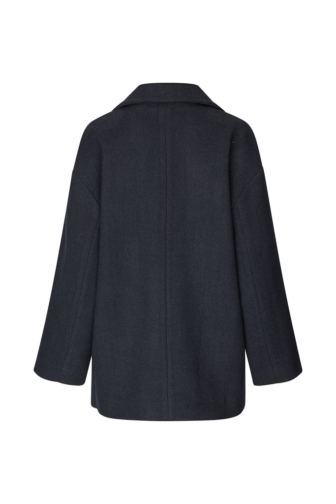 Dark blue coat on a white background