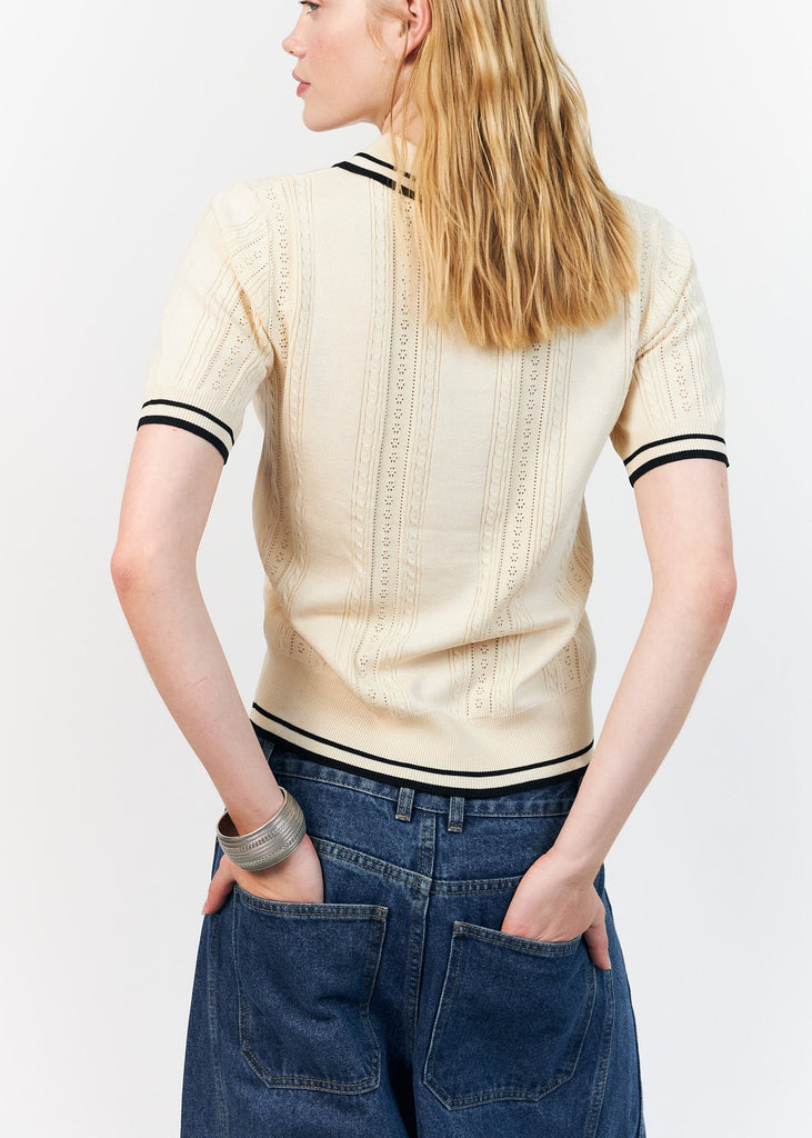  Lolly's Laundry Andrea Polo is a feminine and elegant knitted polo made from a soft and lightweight knit 