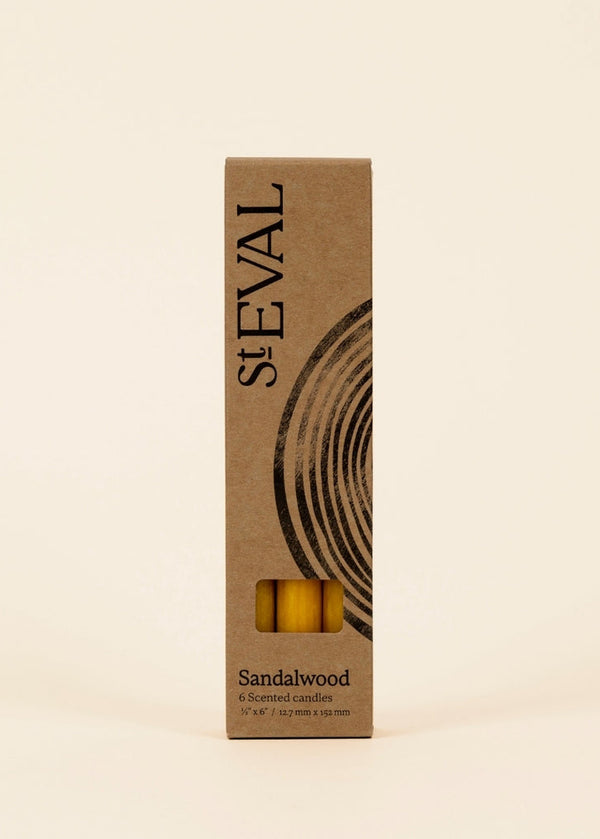 St Eval sandalwood product packaging on a beige background