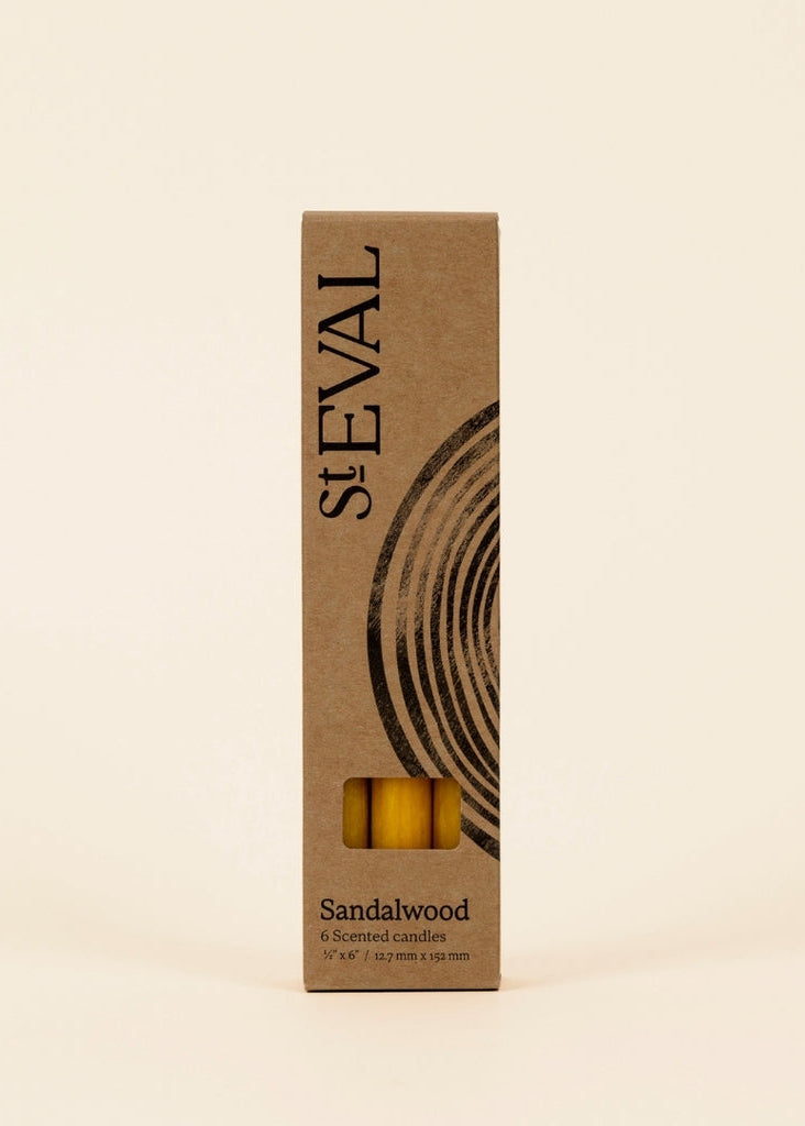 St Eval sandalwood product packaging on a beige background