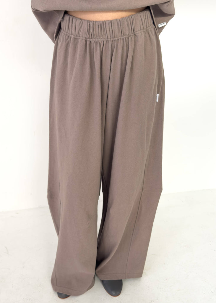 Brown wide-leg pants on a white background