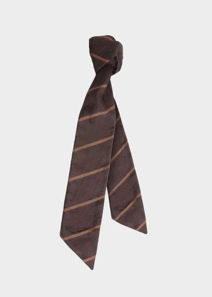 Brown striped tie on a light gray background