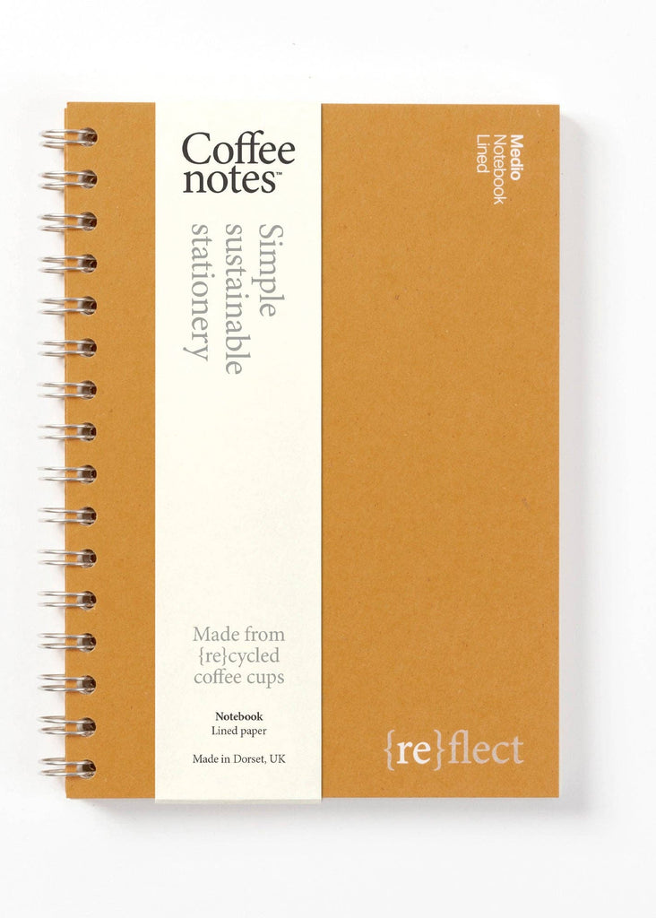 Sustainable notebook made from recycled coffee cups with visible branding on a white background