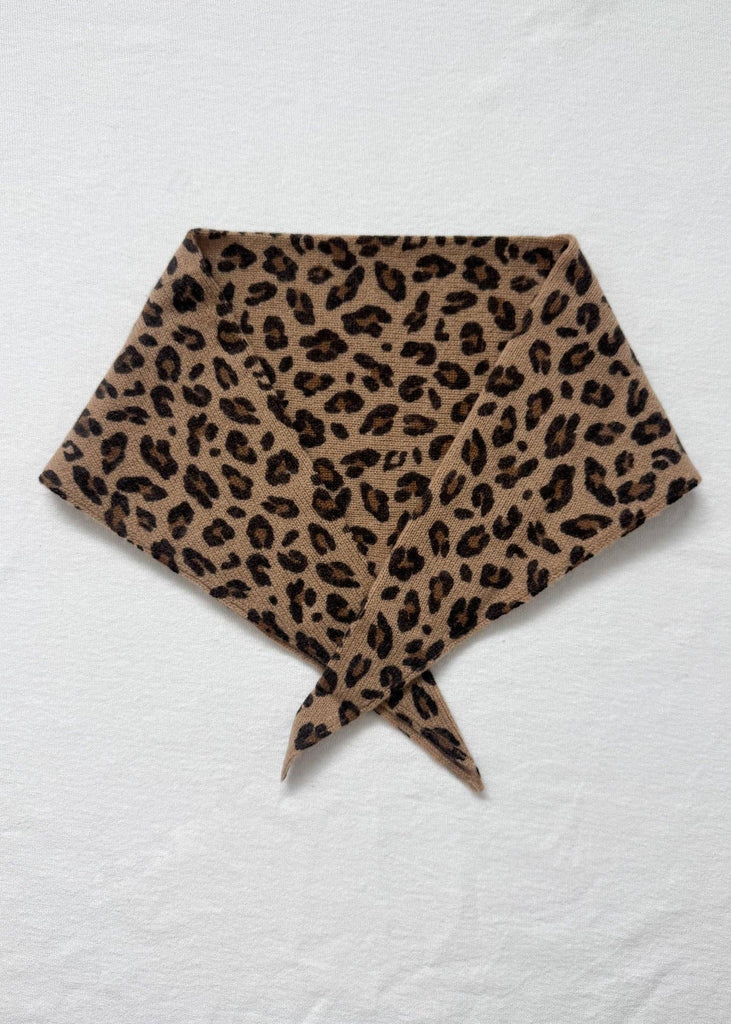 Leopard print headscarf on a white background