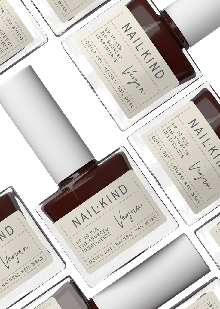 NailKind vegan nail polish bottles arranged in a grid on a white background