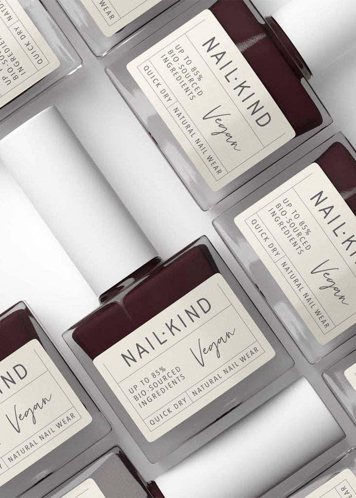 NailKind vegan nail polish bottles arranged on a white background