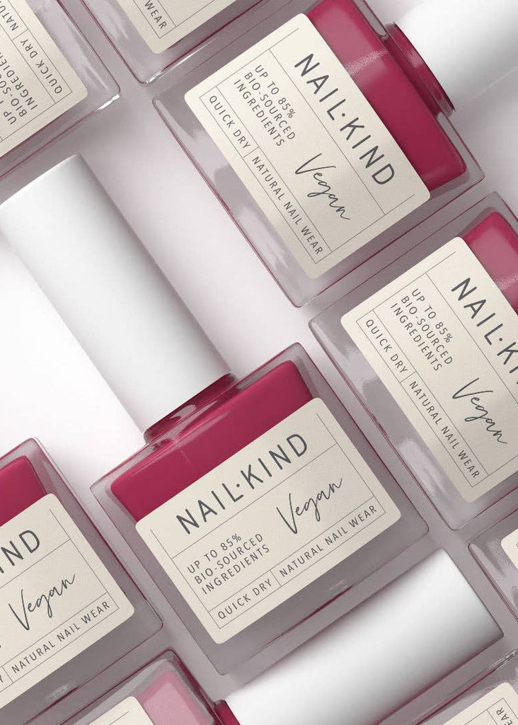 NailKind vegan nail polish bottles arranged on a light background