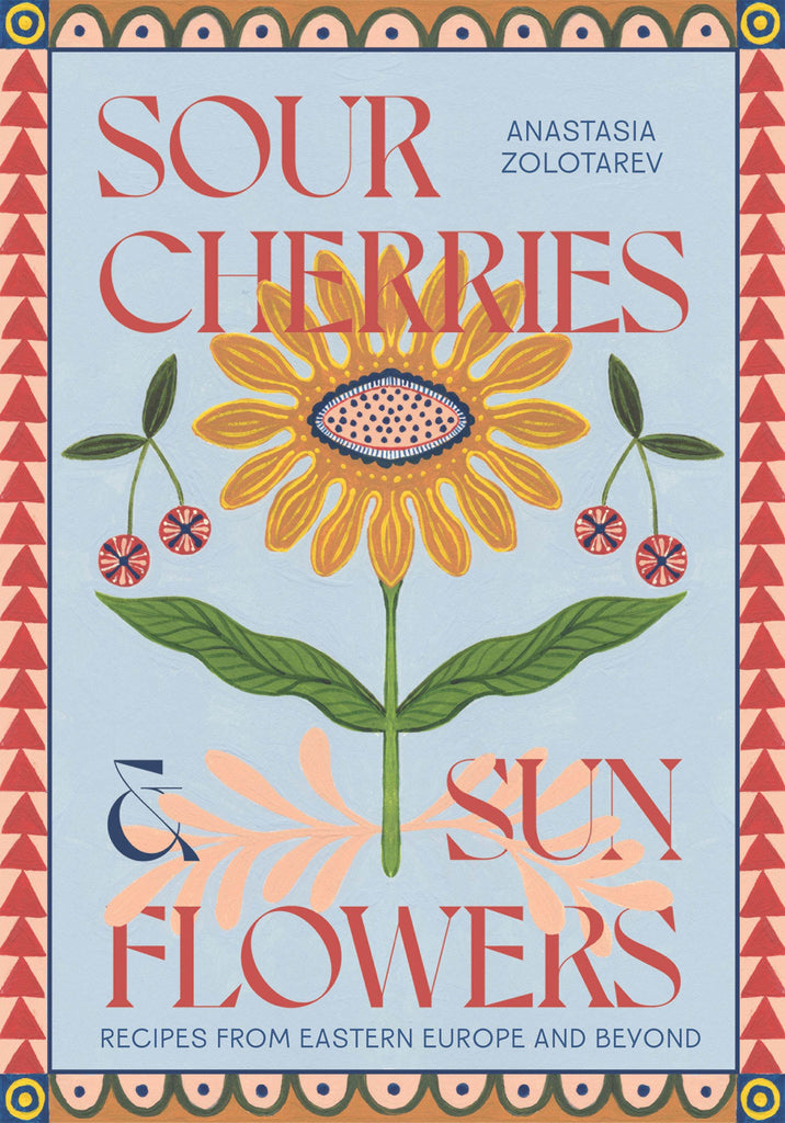Book cover of 'Sour Cherries & Sunflowers' with a stylized sunflower illustration on a light blue background.