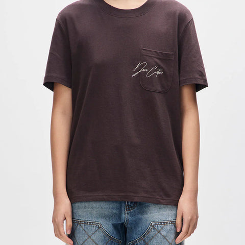 Person wearing a brown t-shirt with a logo on a white background