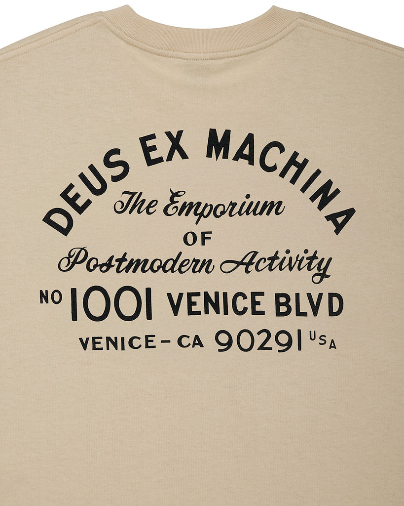 Beige t-shirt with black text on the back