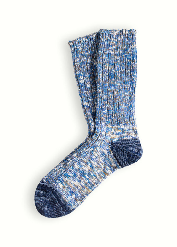 Pair of blue and gray marbled socks on a white background