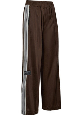 Brown track pants with a white stripe on a white background