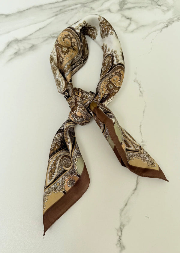 Patterned scarf on a marble surface