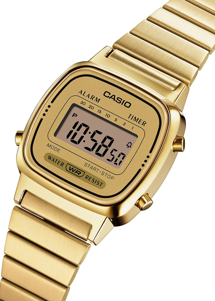 Gold Casio digital watch on a white background