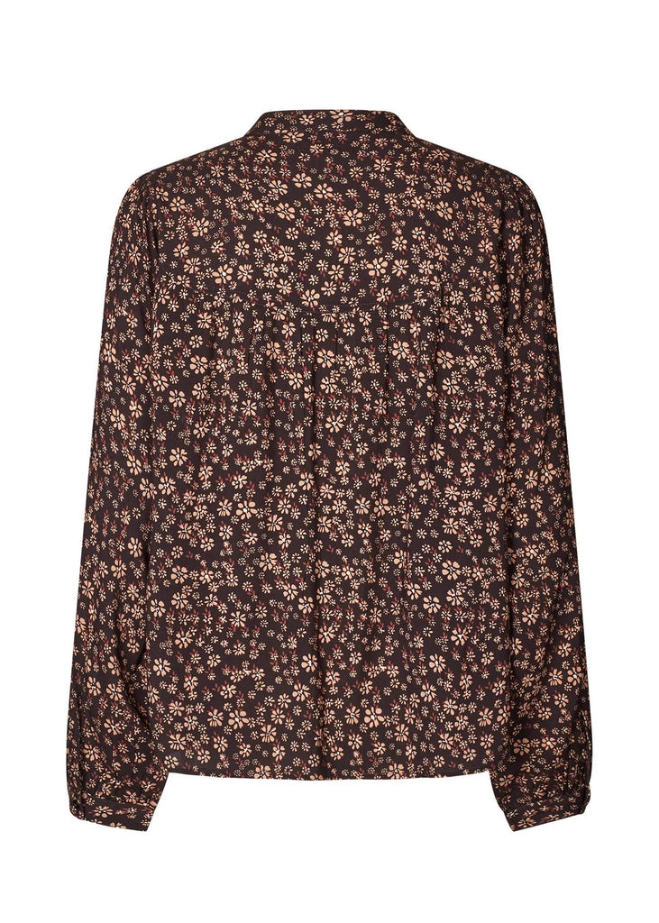 Floral patterned shirt on a white background