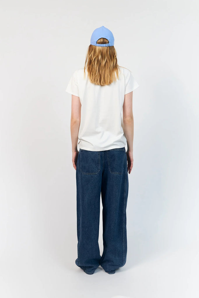 The Lolly's Laundry Roma Tee is a classic T-shirt made from soft cotton with an artistic, graphic print. The motif with red and blue details