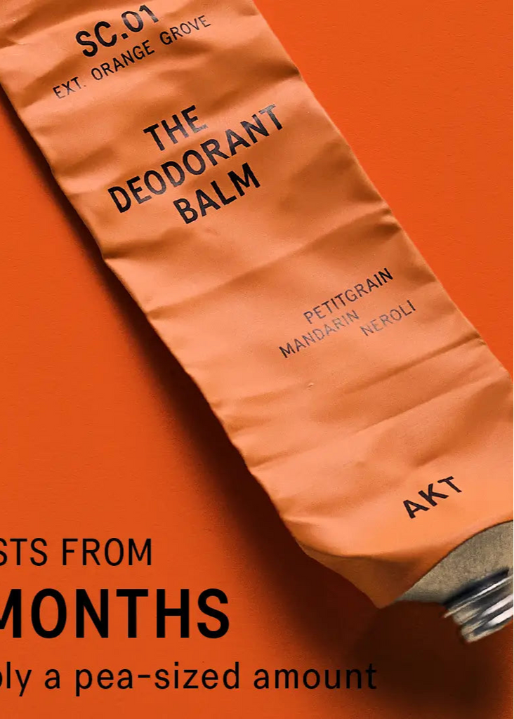 Deodorant balm packaging with text on an orange background