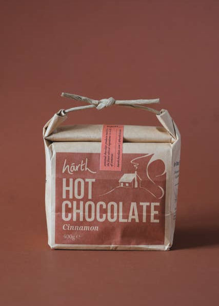 Box of Harth Hot Chocolate Cinnamon on a brown background