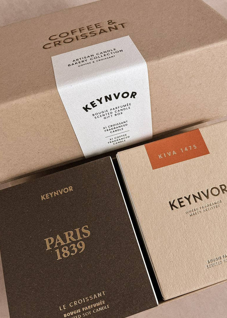 Keynvor candle packaging with 'Coffee & Croissant' and 'Paris 1839' labels on a beige background