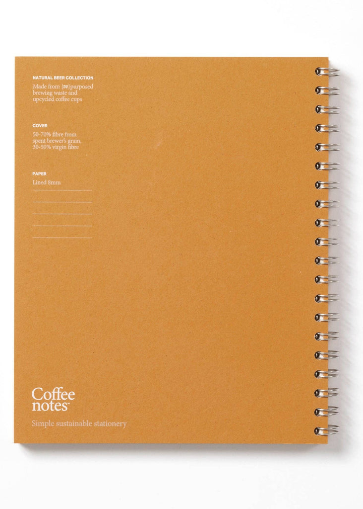 Orange notebook with 'Coffee Notes' branding on a white background