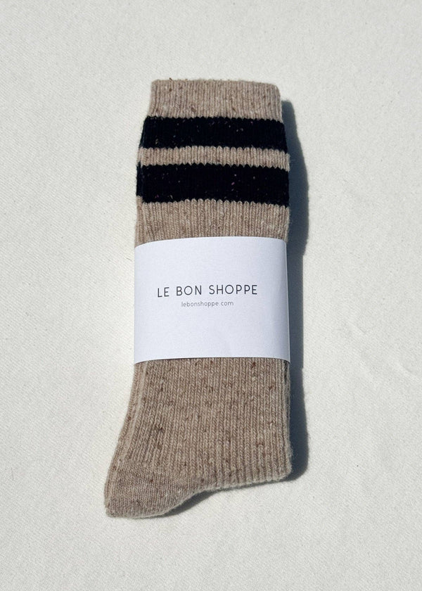 Beige sock with black stripes on a white background, featuring 'Le Bon Shoppe' label.