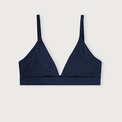 Navy blue bralette on a light gray background