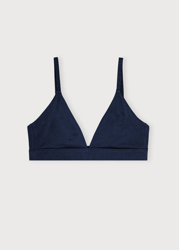 Navy blue bralette on a light gray background