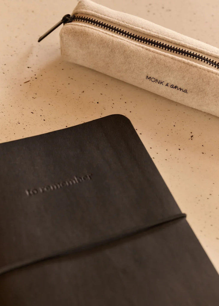 Monk & Anna Notebook is vegan leather in a pebbled black