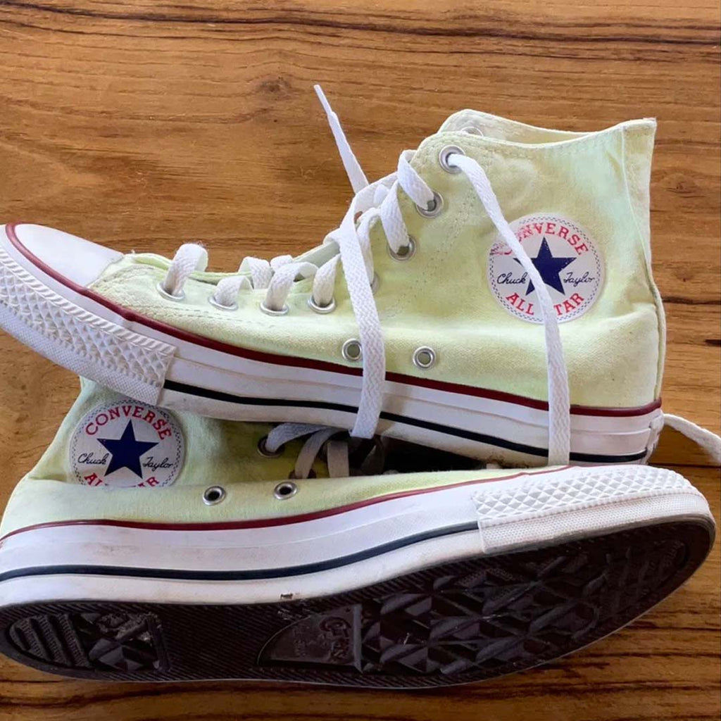 Converse All Star Chuck Taylor High Top trainers in lime green