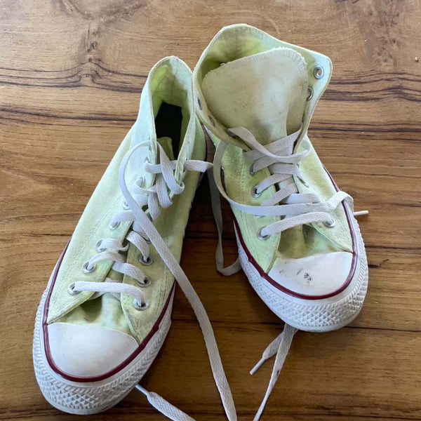 Converse All Star Chuck Taylor High Top trainers in lime green